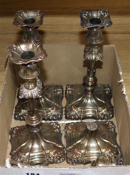 A set of four electroplated candlesticks